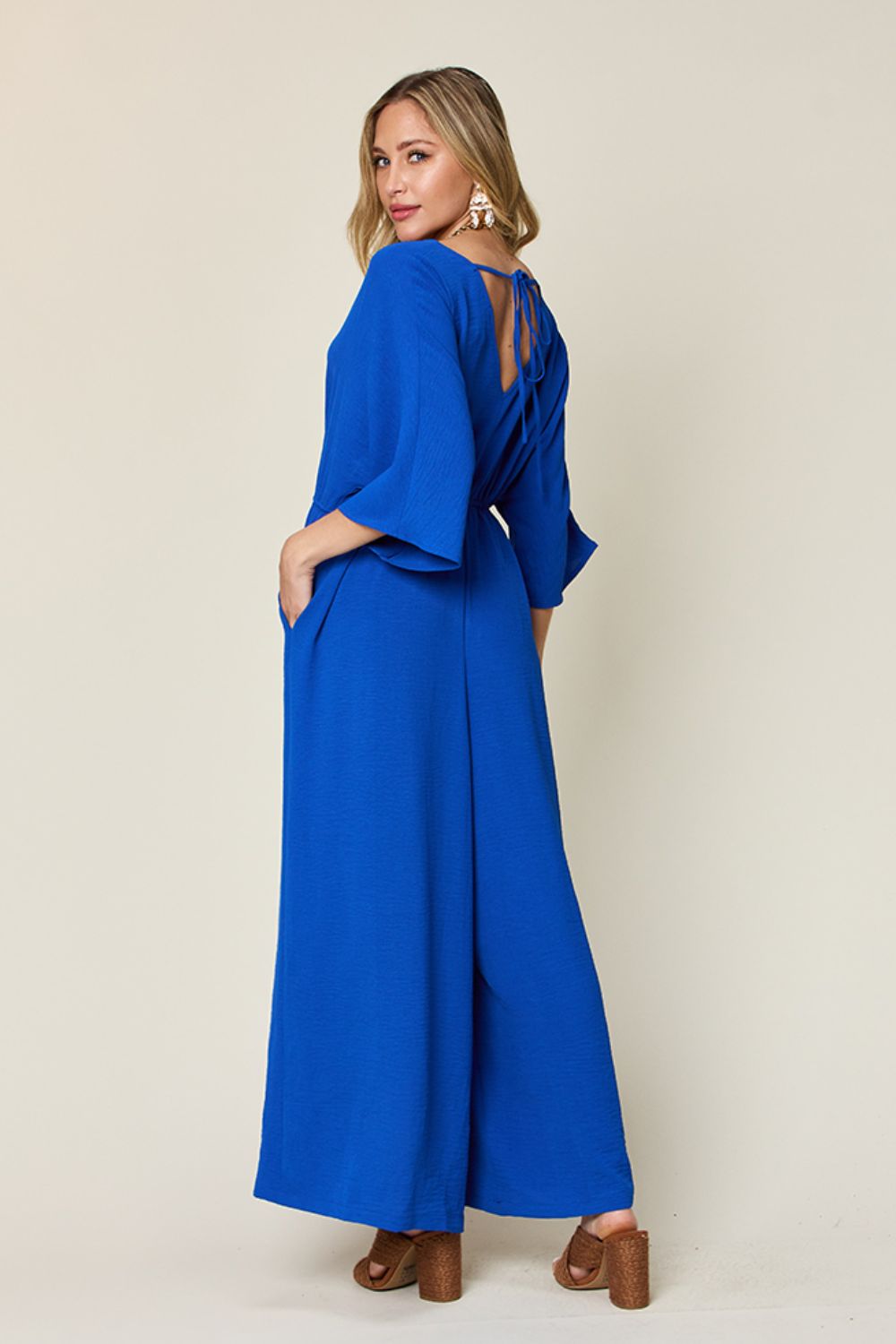 Full Size Surplice Wide Leg Jumpsuit with Pockets - Necessary Clothing Store